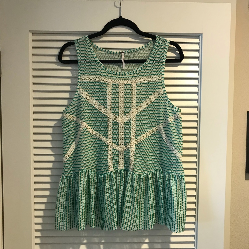 Embellished green peplum tank